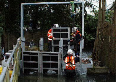Penstock Sluice Structure Installed in Flooded River
