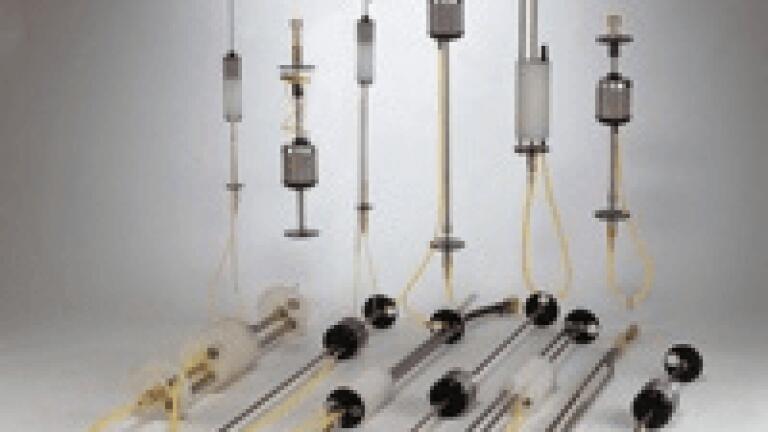 Geotech skimmers rise and fall with the product while air-driven bladder pumps extract contaminant