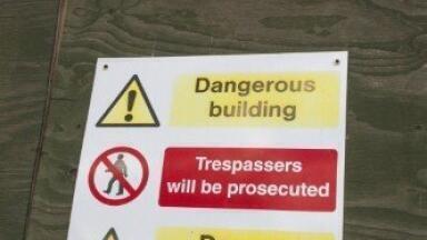 Toxic waste labelled drum left in children's play area