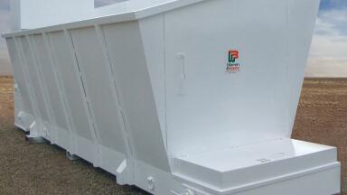 Metering-Surge Bin for Biomass Materials