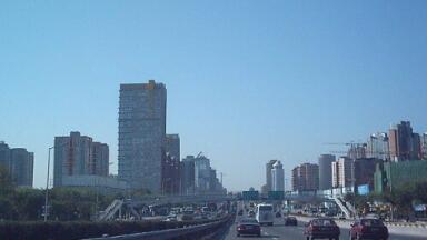 Beijing's heavy smog results in the sun being televised for residents