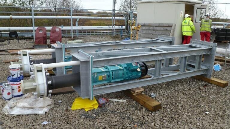 Wernert variable speed vertical cantilever shaft pumps being prepared for installation.