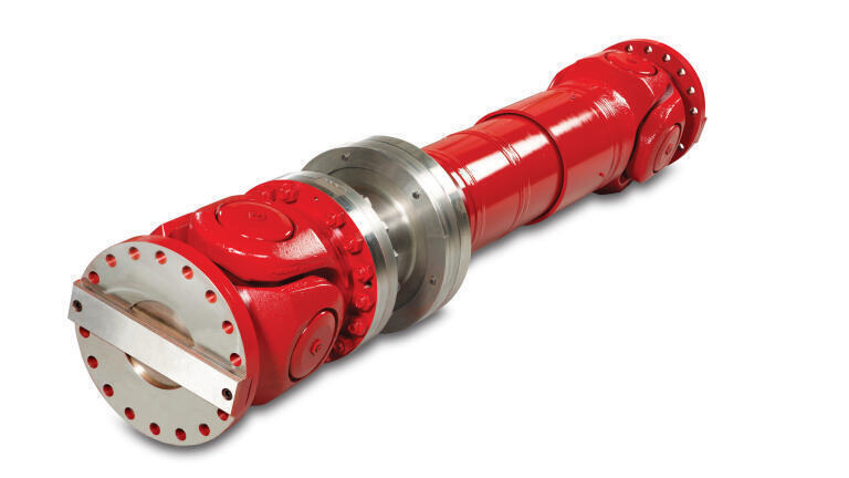 An Americarden U3440 universal joint was modified to incorporate a shear pin overload device
