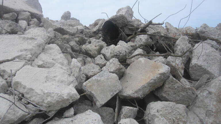 Chrysotile bitument pipe in rubble