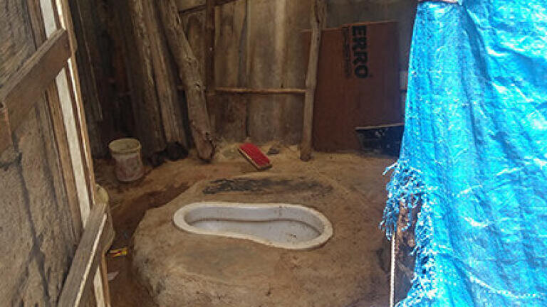 Photo credit Dr Simon Willcock, Bangor University - An example pit latrine, where human waste is deposited in the soil where nature is able to safely sanitise it.