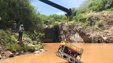 Surveying in Crocodile -infested waters